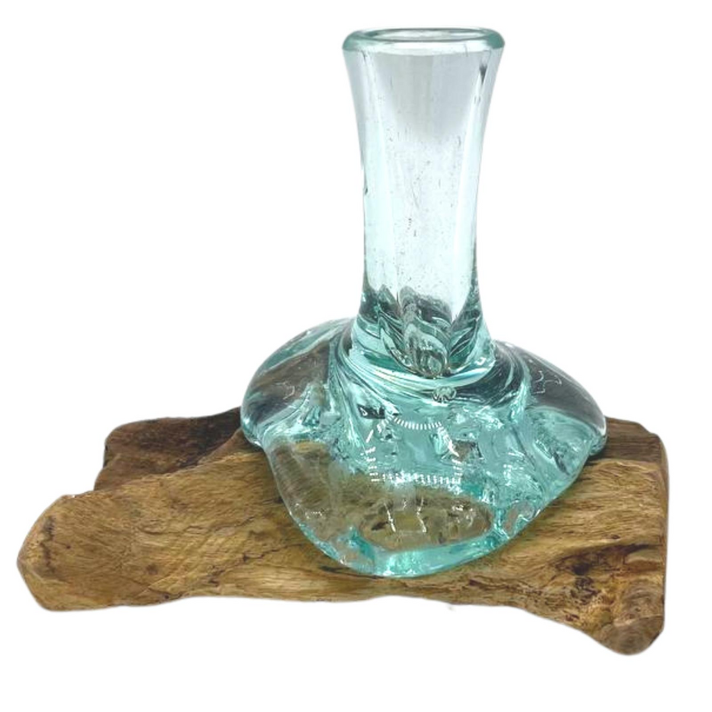 Small decorative glass vase from Ancient Wisdom, made with melted glass on natural wood, featuring a unique artisanal design.