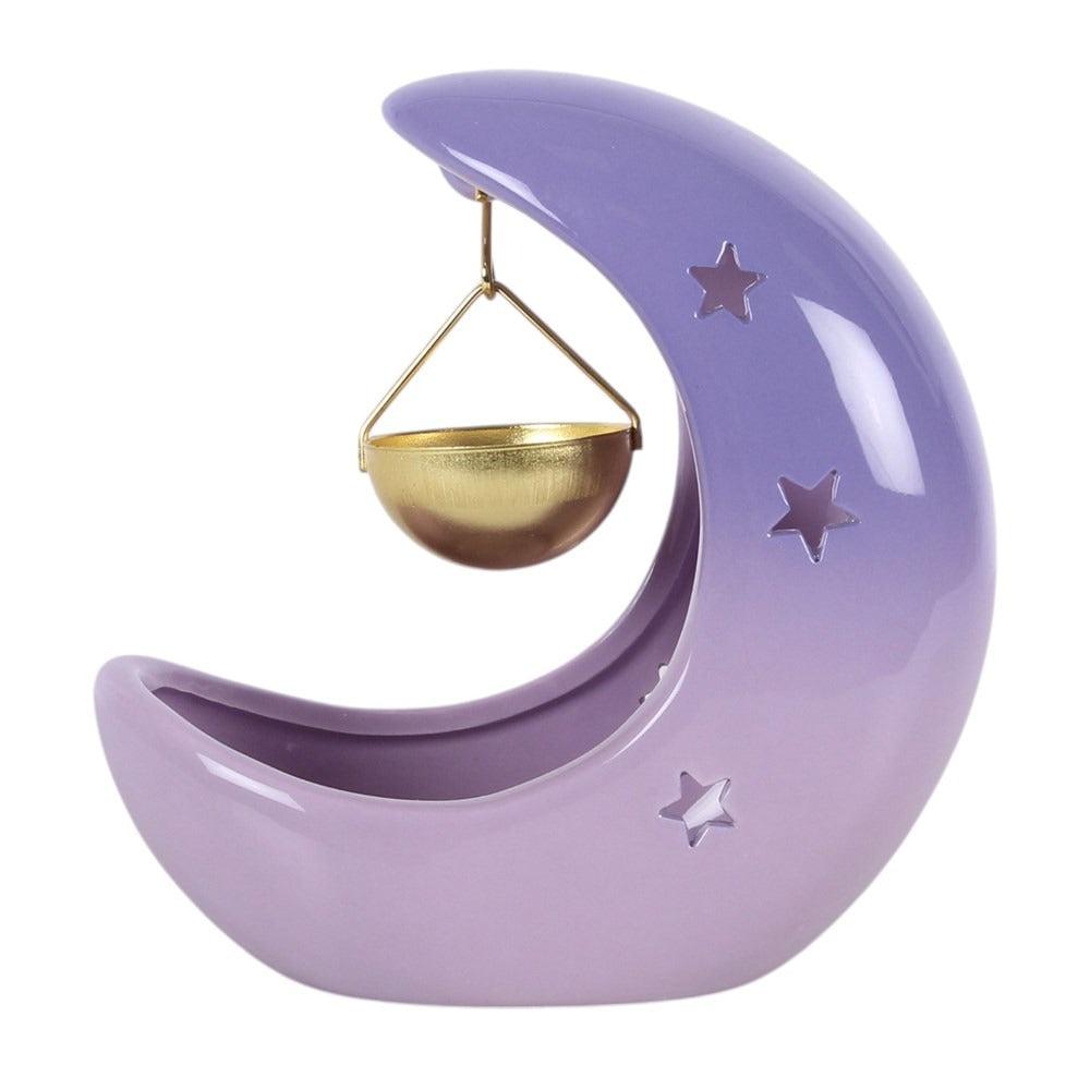 Detaliu al arzătorului ceramic mov pastel, cu stele decupate în forma de semilună